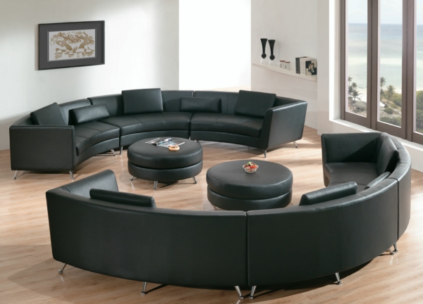 living-room-furniture-black-leather-round-sectional-sofa-in-small-apartment-living-room-with-black-round-leather-coffee-table-also-shaw-laminate-wood-flooring-astonishing-round-sectional-sofa-design