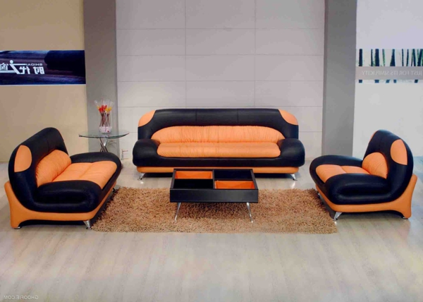 wohnzimmer-design-sofa-leder-mit-elegantem-design-orange-schwarz