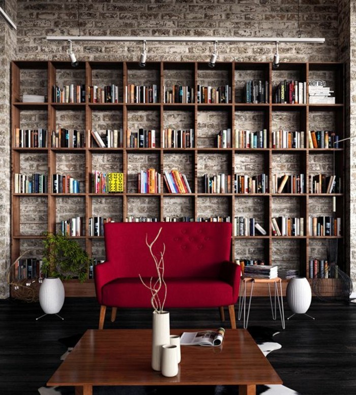 moderne-Wohnung-Ziegelwände-Bücherwand-modernes-kleines-rotes-Sofa