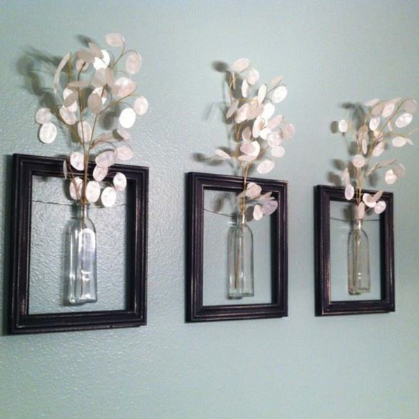 drei kleine vasen an der wand - dekoration idee