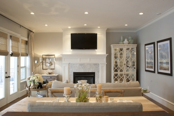 wohnzimmer mit wandgestaltung in grau une einem luxus kamin
