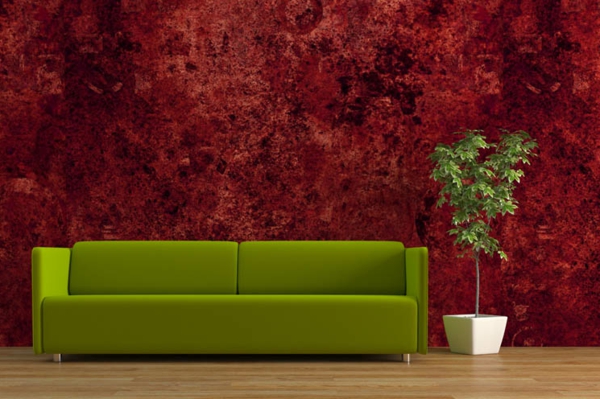interessante-wandgestaltung-dunkel-rot- und ein sofa in grün