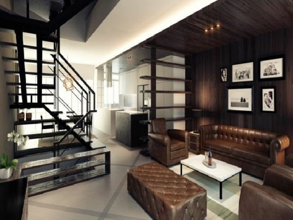 elegantes-wohnzimmer-braune-farbtöne- treppen und ledersofa mit zwei sesseln und einem hocker