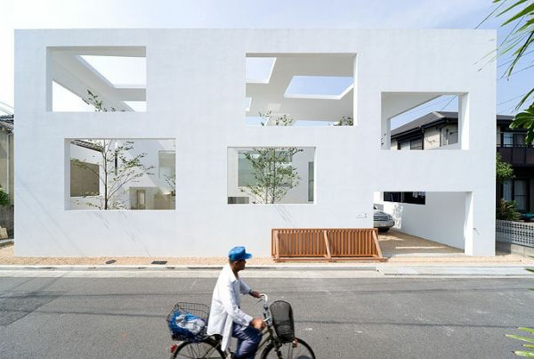 moderne-idee-für-minimalistische-architektur-man mit fahrrad