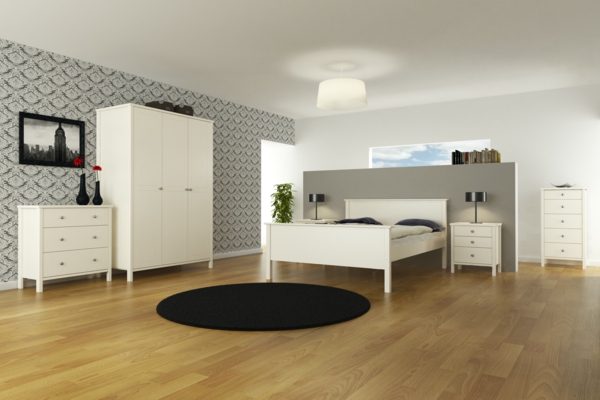 schöne-weiße-schlafzimmermöbel-runder teppich in schwarz