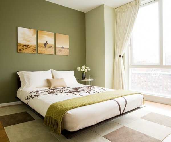 eigenartiges-schlafzimmer-mit-wandfarbe-olivgrün- schönes bett