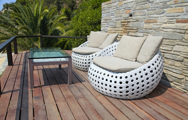 White outdoor furniture on wood resort terrace