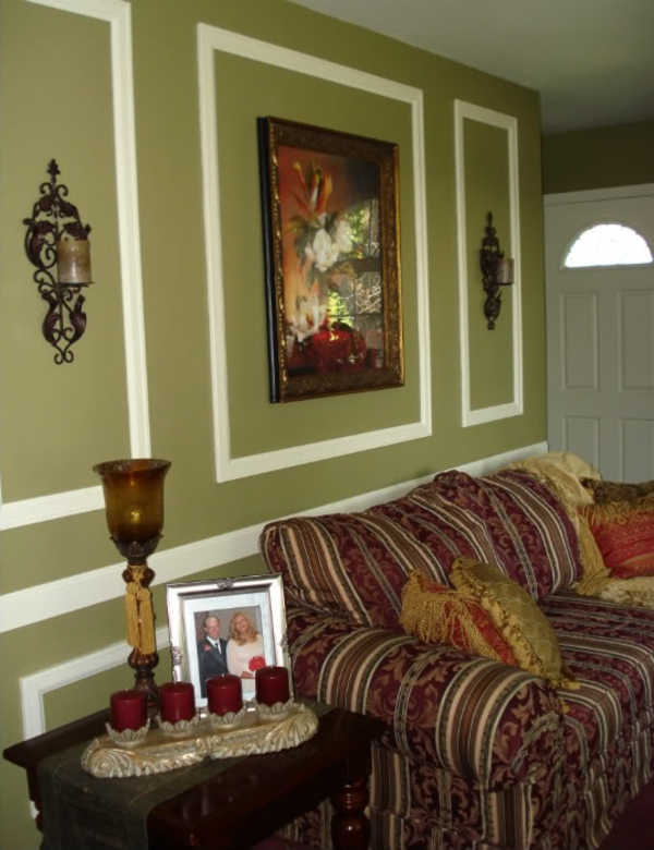 wandfarbe-olivgrün-für-ein-schönes-zimmer- dekokissen auf dem sofa