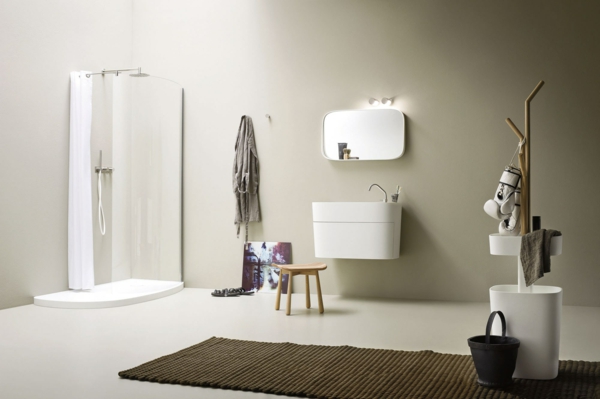elegantes badezimmer mit einer duschkabine und einem weißen Waschbeckenunterschrank mit Schubladen