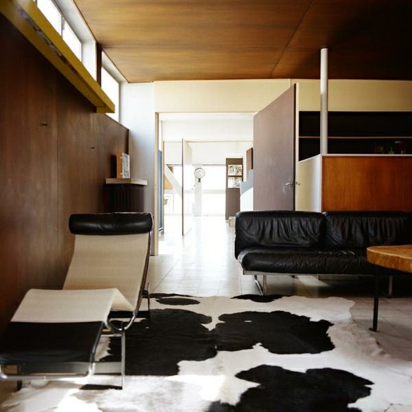 relax-liegestuhl-schöne-zimmergestaltung - mit einem teppich in weiß und schwarz