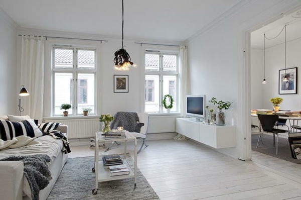 skandinavisches-design-für-ein-schickes-wohnzimmer- grau und weiß