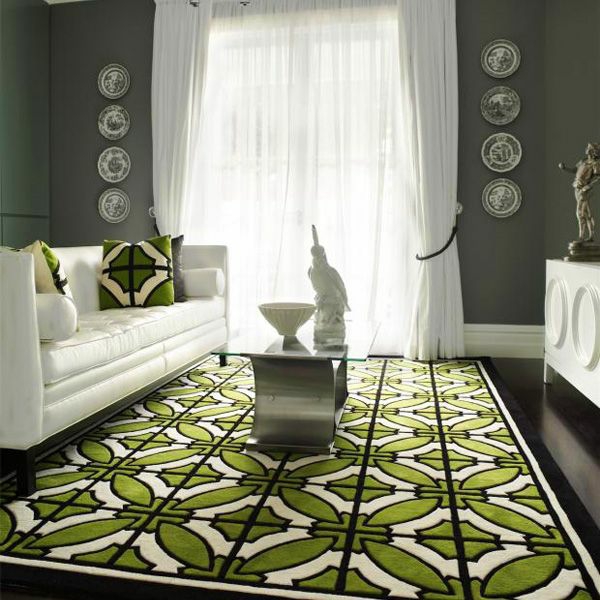 Teppich-in-Grün-mit-geometrischen-Figuren