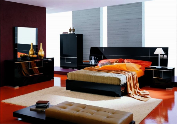 elegantes schlafzimmer mit orangen akzenten