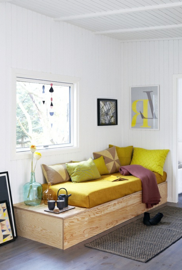 gestaltungsmöglichkeiten-für-wohnzimmer-gelbe-dekokissen