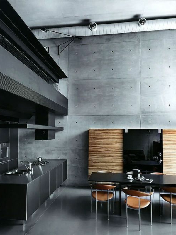 moderne-küchenmöbel-im-attraktiven-dunklen-wohnraum-mit-einem-esstisch