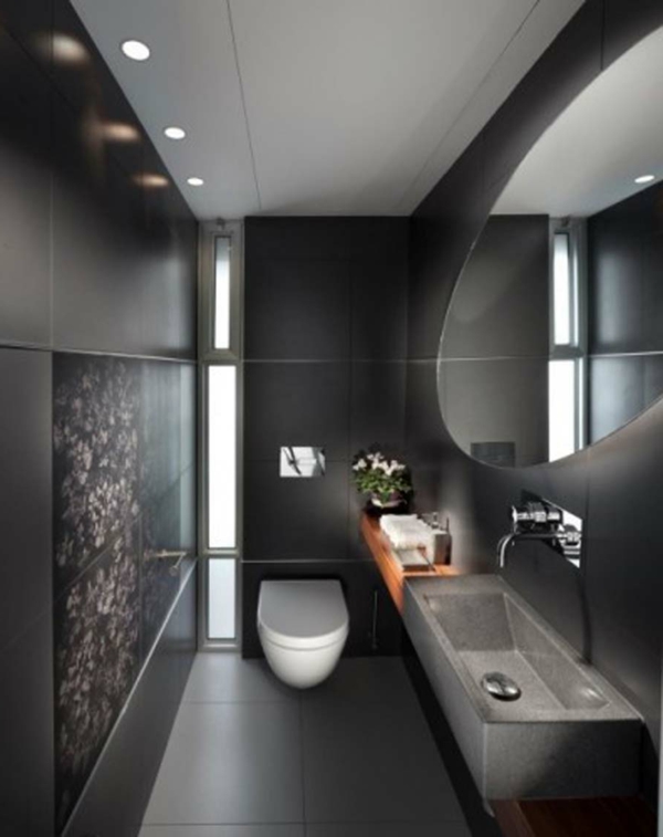 schwarzes-badezimmer-mit-einem-luxuriösen-spiegel