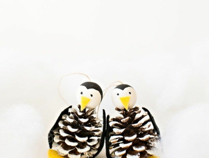 fensterdeko weihnachten basteln pinguine aus zapfen und filz diy machen