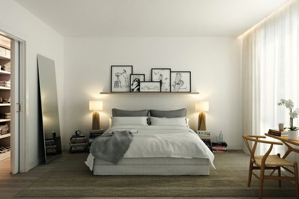 kleines-schlafzimmer-einrichten-zwei-lampen-und-bilder-an-der-wand