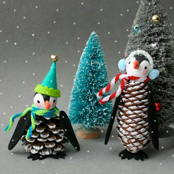 weihnachtendeko fenster basteln süße pinguine zwei aus zapfen und filz diy