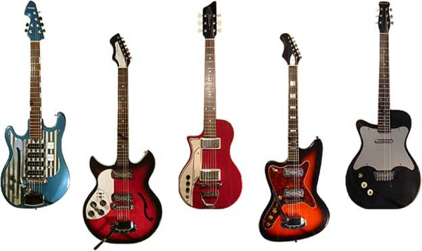 fünf-verschiedene-vintage-guitars-weißer-hintergrund
