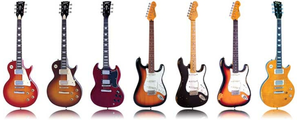 viele-schön-aussehende-vintage-guitars-hintergrund-in-weiß