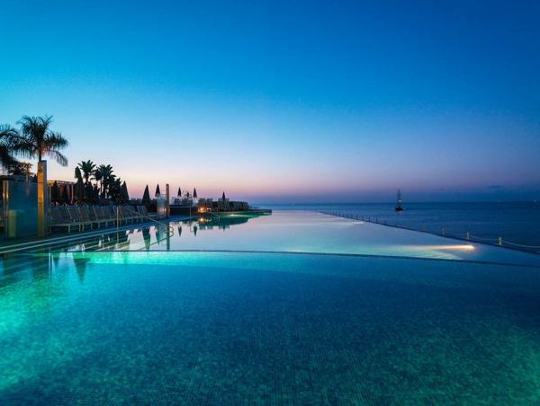 Infinity pool at sunset 