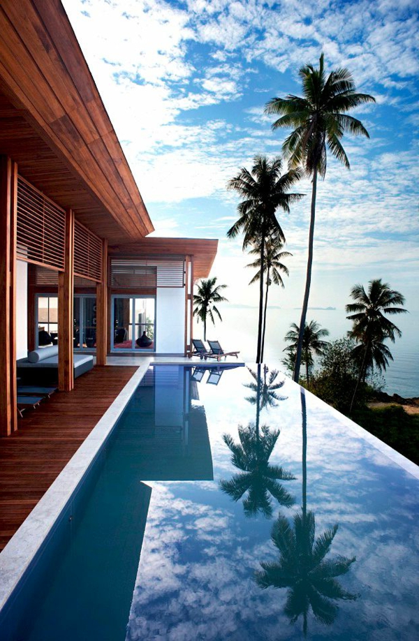 schwimmbecken-mit-palmen-design-idee-infinity-pool-wunderschönes-design