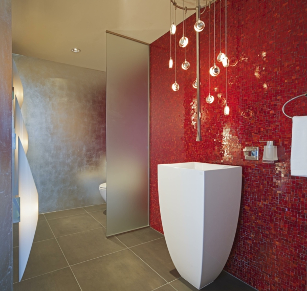 contemporary-bathroom-with-red-glass-tile-wall-and-bathroom-sink-and-faucet-also-glass-room-dividers-with-bathroom-tile-flooring