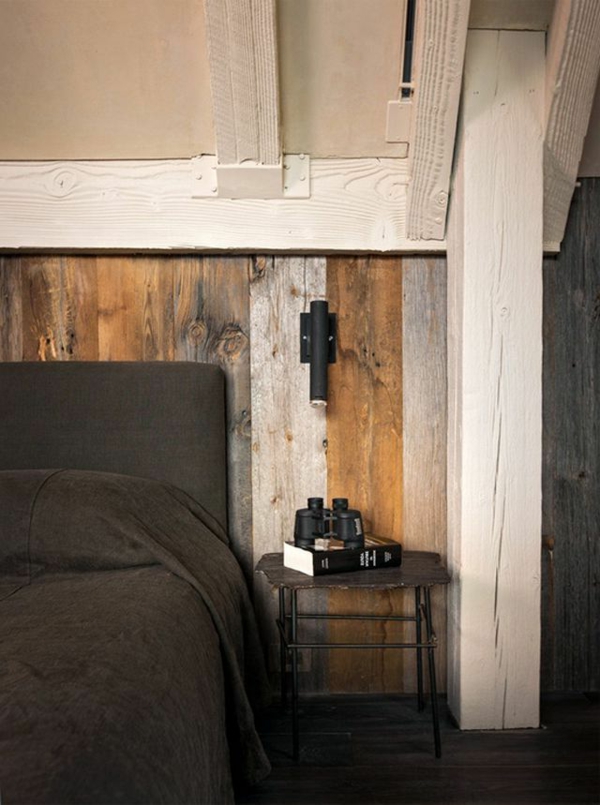 schlafzimmer-aus-massivholz-modernes-bett-mit-dunklen-bettwäschen