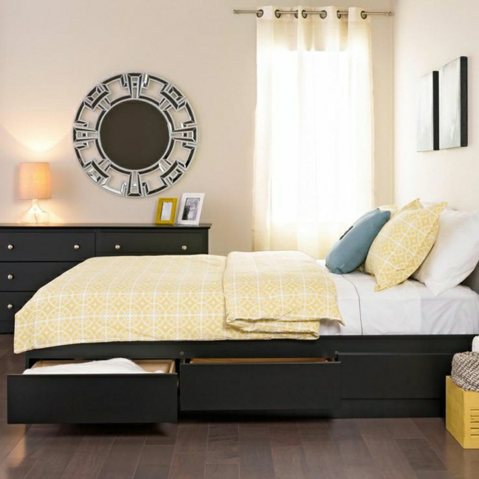 elegantes-Schlafzimmer-Bett-mit-Schubladen-Kommode-Wanddekoration-gelbe-Bettwäsche