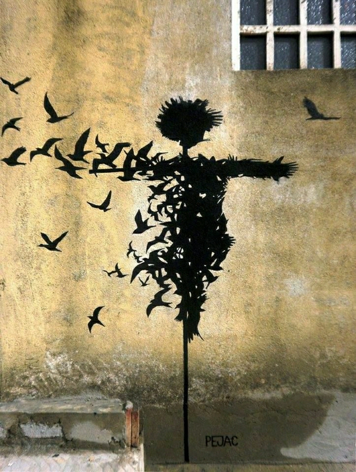 Graffiti-street-art-Strohpuppe-Vögel