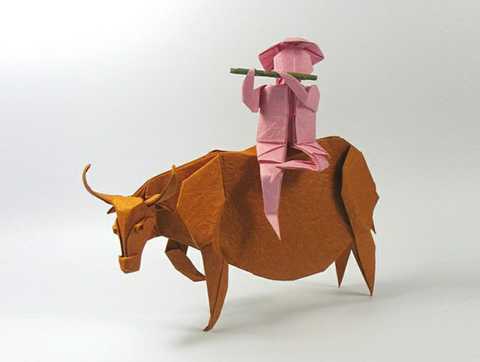origami-tiere-ein-mensch-auf-einem-bulle