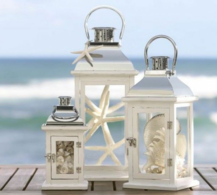 Hochzeit-am-Strand-Dekoration-Muscheln-Seesterne-weiße-Laternen-romantisch