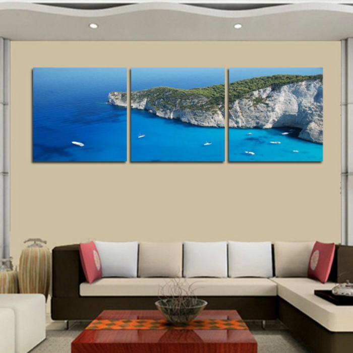 Wandgestaltung-Wohnzimmer-marin-bilder-sofas