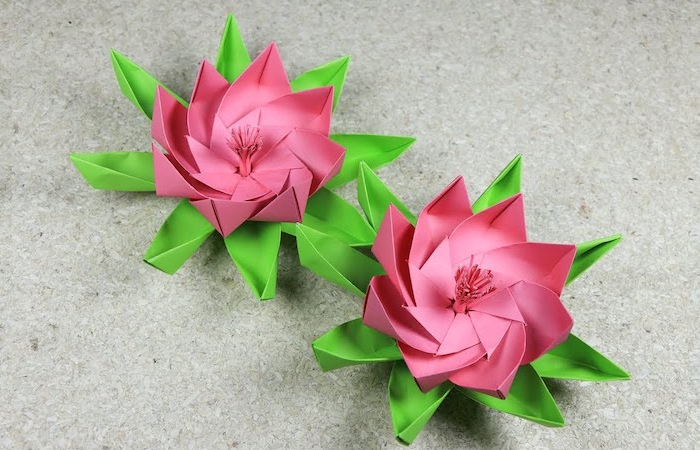 origami blume flach zwei lotus blumen in rosa und grün