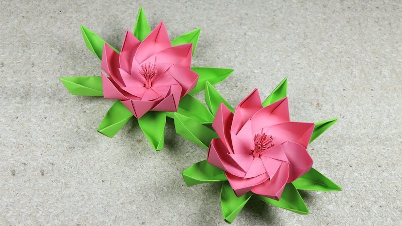 origami blume flach zwei lotus blumen in rosa und grün