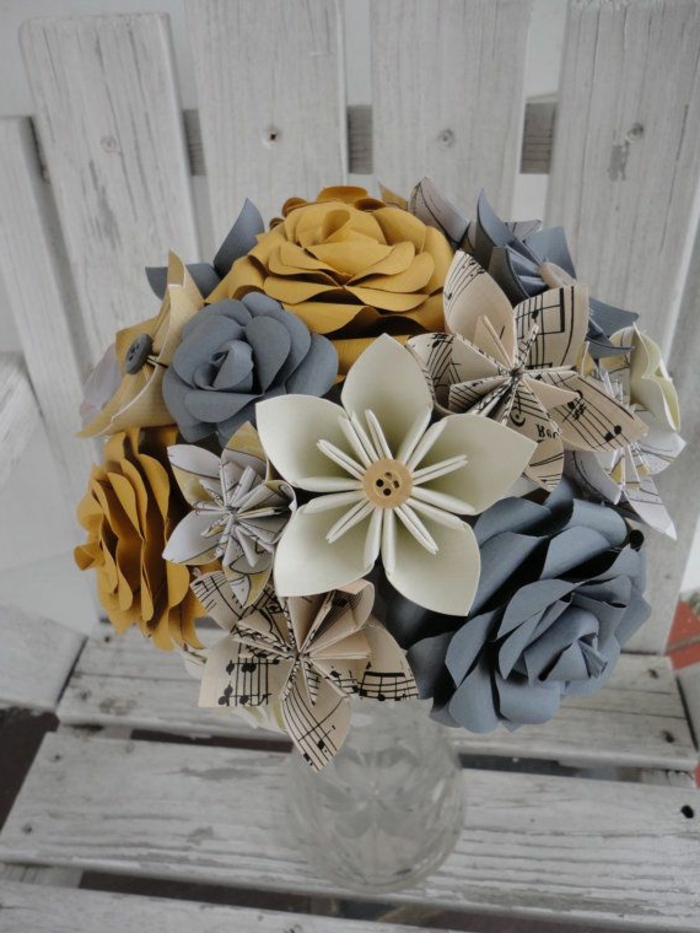 origami-blumen-Papier-Noten-Knopf-schönes-Desig-kreativ-Hochzeitsstrauß