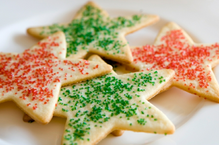 Star-shaped holiday sugar cookies sprinkled with red and green sugar.