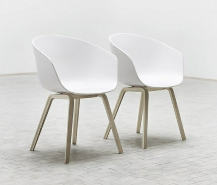 weiße-Loungesessel-Designer-Stühle-Lehne-innovatives-Design