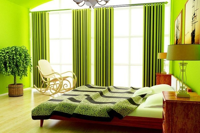 wandfarbe-grün-tolle-gardinen-und-bequemes-bett-im-schlafzimmer