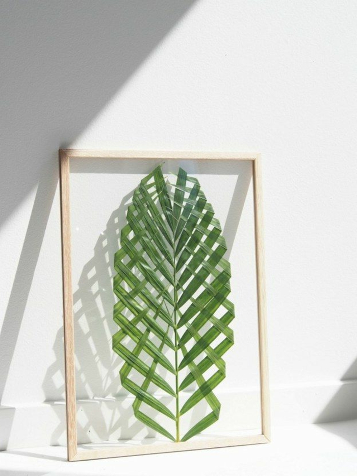 wandgestaltung-selber-machen-eine-figur-in-grün-wie-pflanzenblätter-aussehen