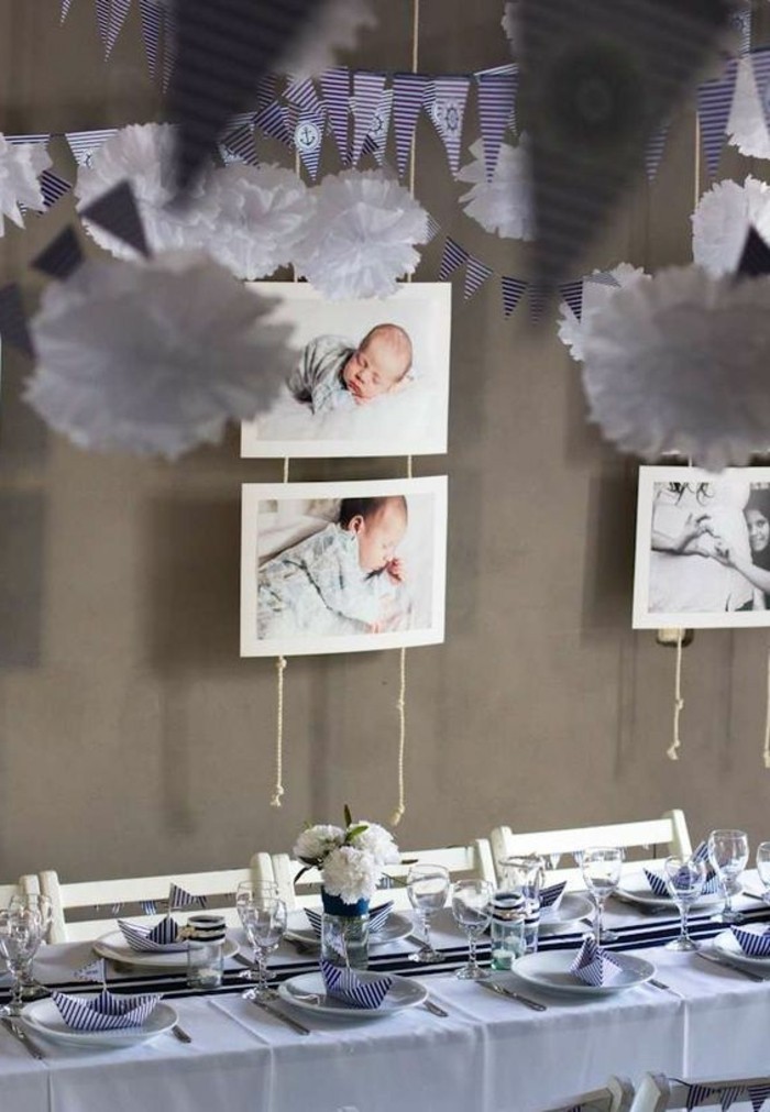 taufe-deko-interessante-hängende-bilder-von-babys-einmalige-tischdekoration