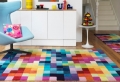 Mit Teppichen gestalten – Farbwirkung in Wohnräumen