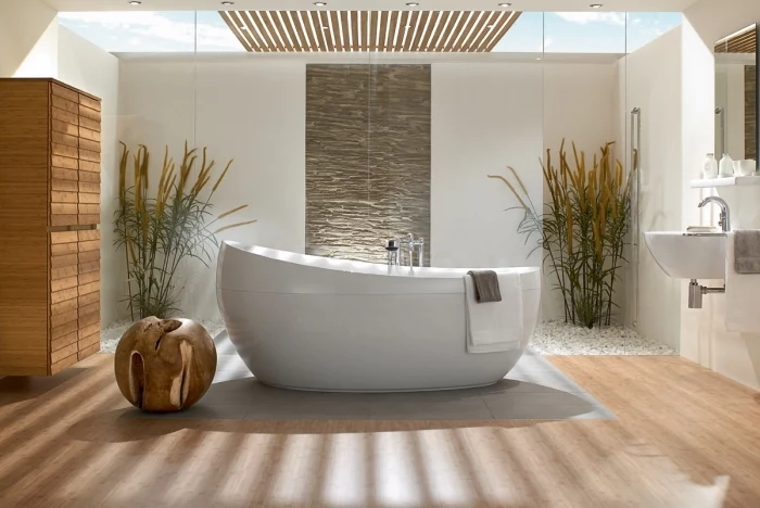  badezimmer deko, badeinrichtung in minimalistischem stil, designer badmöbel, runde decko aus holz, freistehende wanne