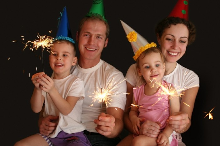 Family Of Four With Sparklers