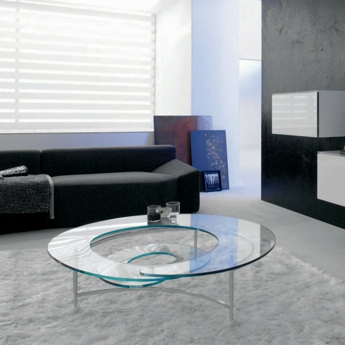 designer-couchtische-glas-spirale-form-weisser-plueschteppich-schwarze-couch-schwarze-wand