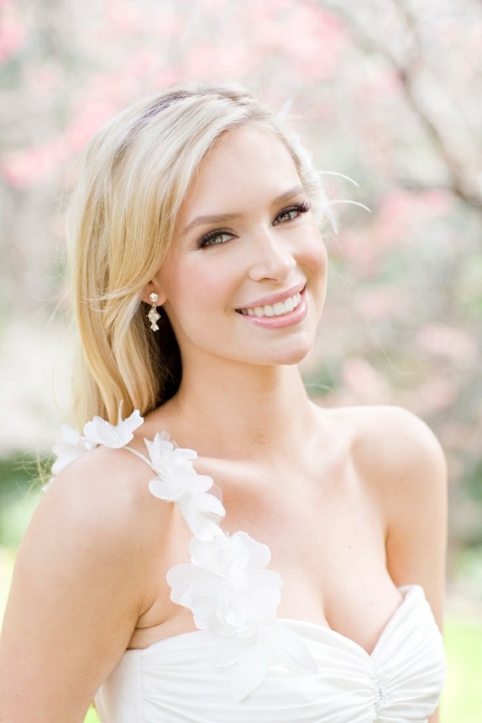 wedding makeup subtle make up-white-skin-and-blonde-hair-flowers-decoration-for-wedding dress