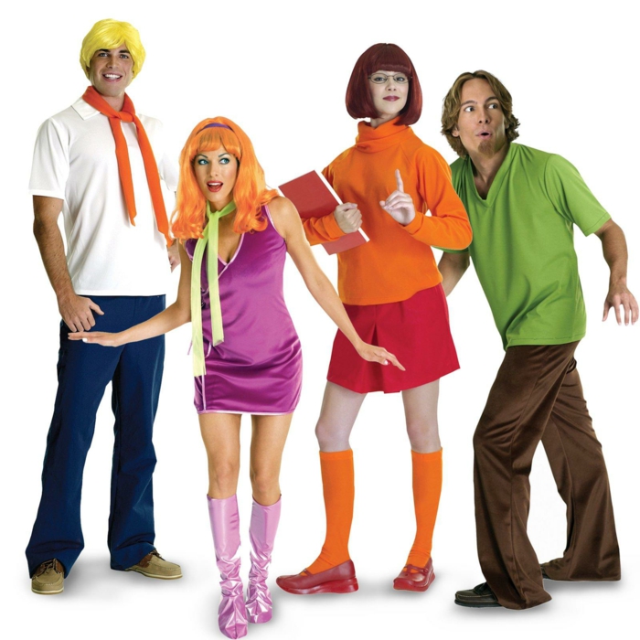 Kostüm Gruppe aus Scooby Doo ohne den Hund von zwei Jungen und zwei Mädchen