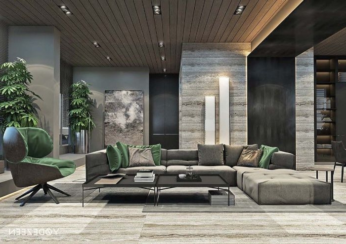 deko wohnzimmer modern, graues zimmer, mit grünen dekorationen, grüner sessel