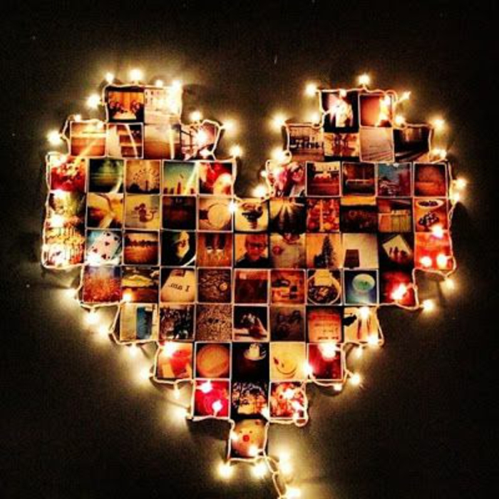 Fotocollage in der Form eines Herzens, dekoriert mit Lichterketten an den Kanten